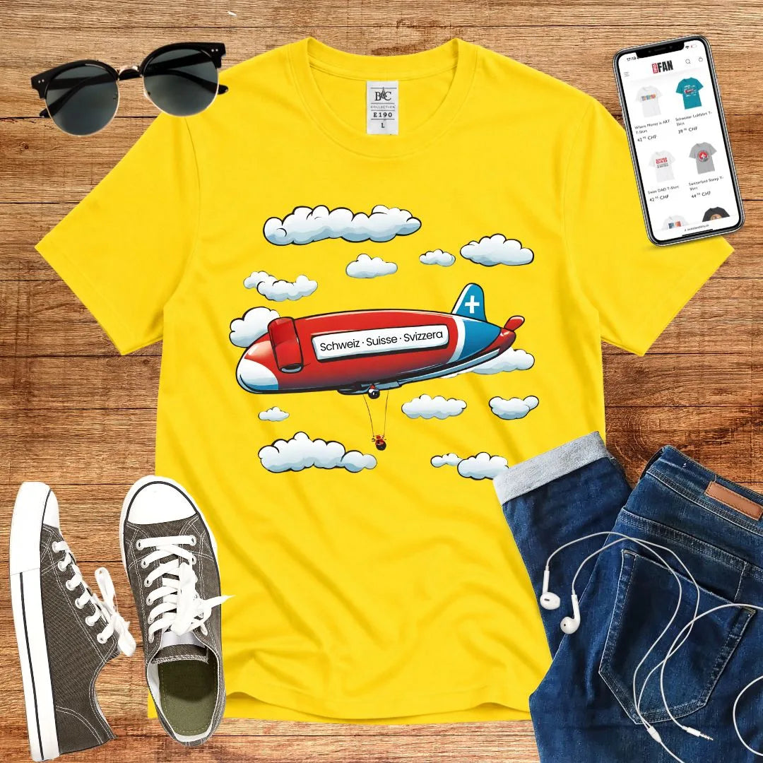 T-Shirt in Solar Yellow mit Zeppelin-Motiv mit Wolken und Schriftzug „Schweiz · Suisse · Svizzera“