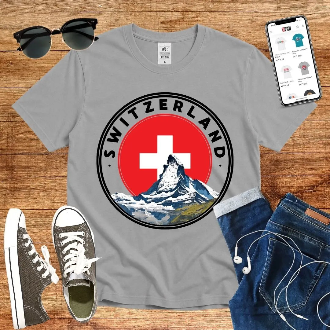 T-Shirt in Sport Grey mit Rundes Design mit Matterhorn und Schweizer Kreuz mit Schriftzug „SWITZERLAND“